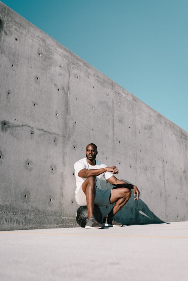 Person doing push-ups on a gym floor